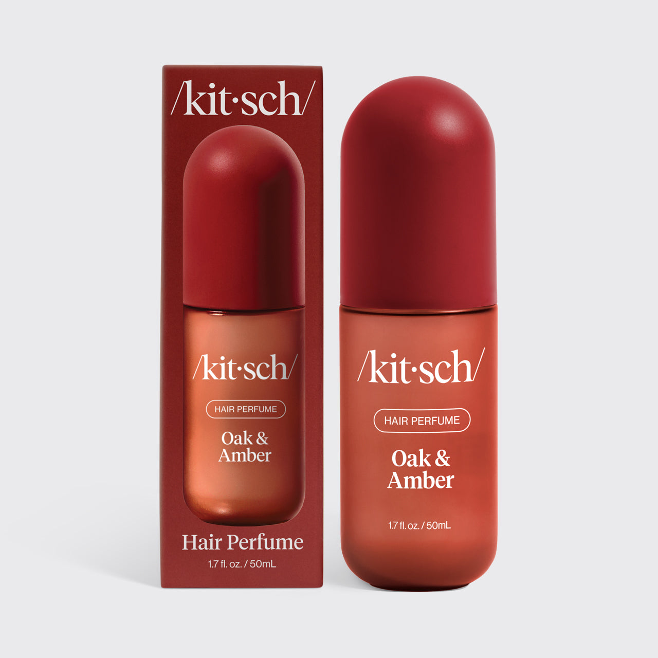 Kitsch Oak & Amber Hair & Body Perfume Mist bottle on a gray neutral background