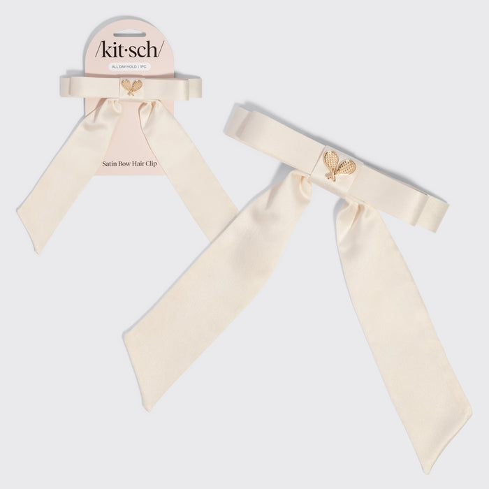 KITSCH Satin Bow Hair Clip - Cream — hero product shot of the cream satin bow clip with a gold tennis-racket charm — Tennis Core Collection — all-day hold for a polished, feminine finish
