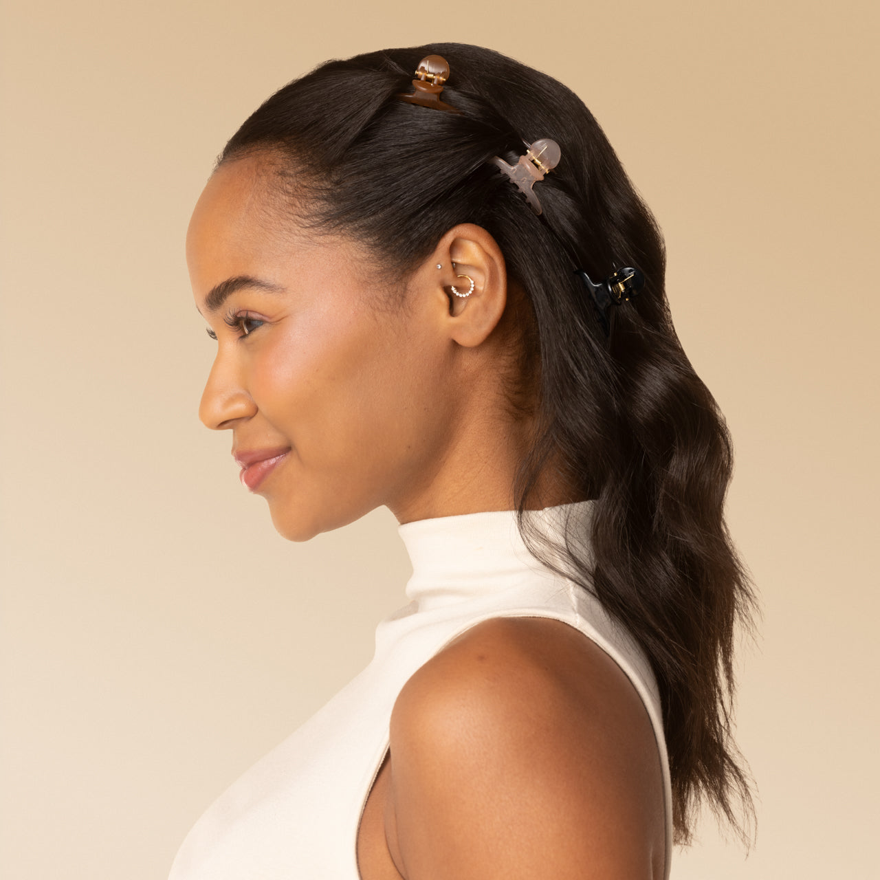 KITSCH Recycled Plastic Mini Arched Clips 6pc Set — model wearing Mocha clip in wavy hair — Made from Recycled Materials — all-day hold