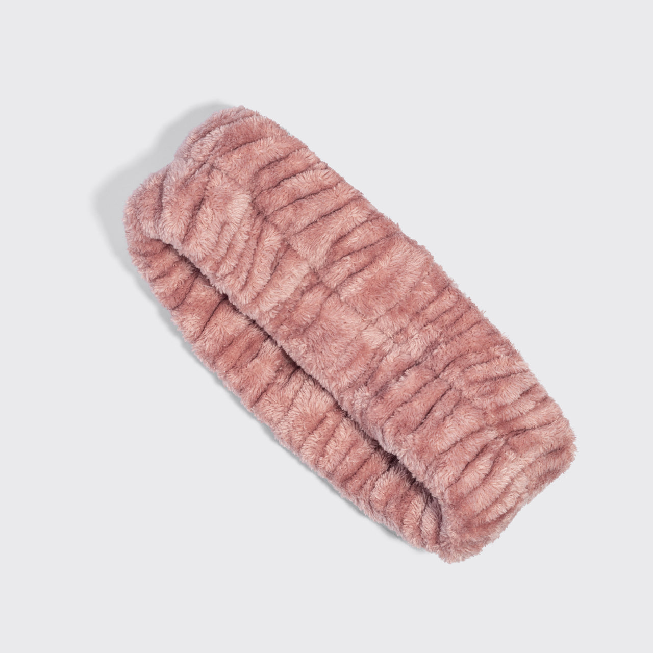 Terracotta Kitsch Spa Headband made from ultra-plush recycled microfiber for keeping hair away from the face during skincare routines.