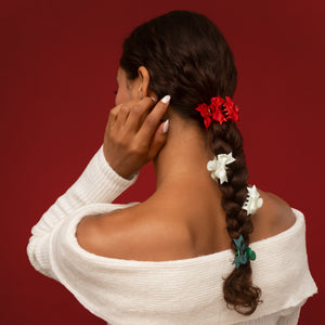 KITSCH Holiday Claw Clips 6pc Set - Mini — back view of red, ivory and green mini clips spaced down a long braid — Perfectly sized for half-up styles, accent pieces, and quick touch-ups — festive styling