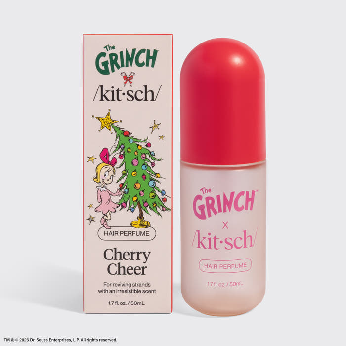 The Grinch x Kitsch Cherry Cheer Hair Perfume 1.7 fl oz bottle next to its Cindy-Lou Who box