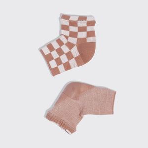 Kitsch Terracotta Checker Moisturizing Heel Socks showing the checked exterior and gel-lined moisturizing heel interior.