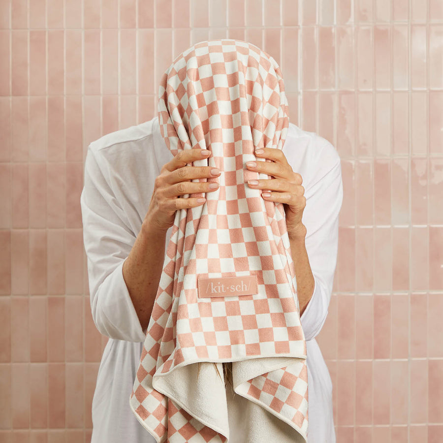 KITSCH Terracotta Checker XL Quick-Dry Hair Towel Wrap — in-use lifestyle shot — wrapped on wet hair — ultra-absorbent microfiber cuts drying time while protecting the hair cuticle