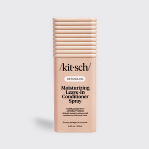 Kitsch Moisturizing Leave-In Conditioner Spray in blush packaging for dry, damaged, and frizzy hair, formulated with Actimilk™ Argan.
