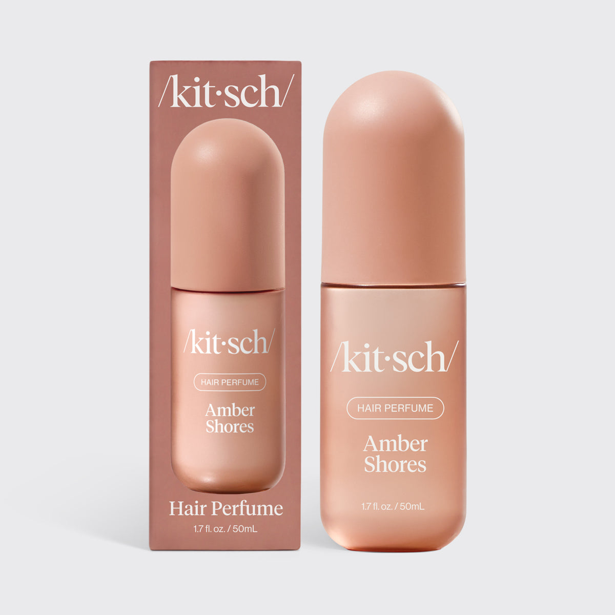 Kitsch Amber Shores Hair & Body Perfume Mist bottle on a soft warm background