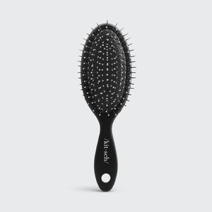 Mini spazzola per capelli da viaggio con setole metalliche create consapevolmente