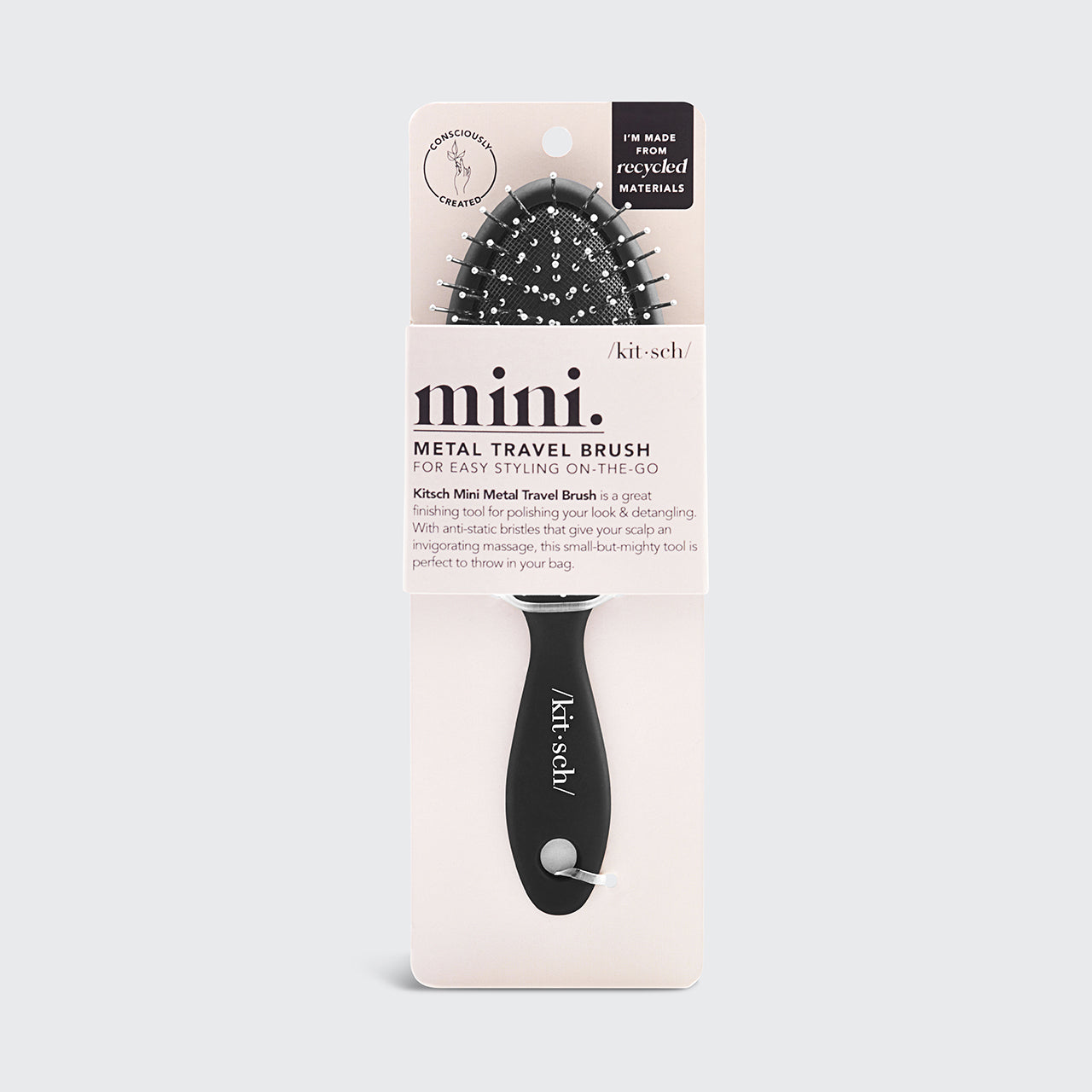 Mini spazzola per capelli da viaggio con setole metalliche create consapevolmente