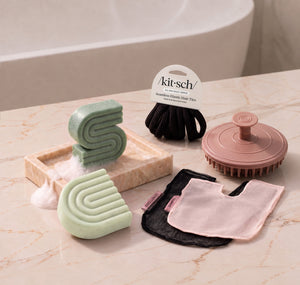 Rosemary & Biotin: Kitsch Free Welcome Kit with Rosemary & Biotin shampoo and conditioner bars, Terracotta Scalp Exfoliator, Blush Shampoo Bar Bag, Black Conditioner Bar Bag, and Black Seamless Hair Elastics.
