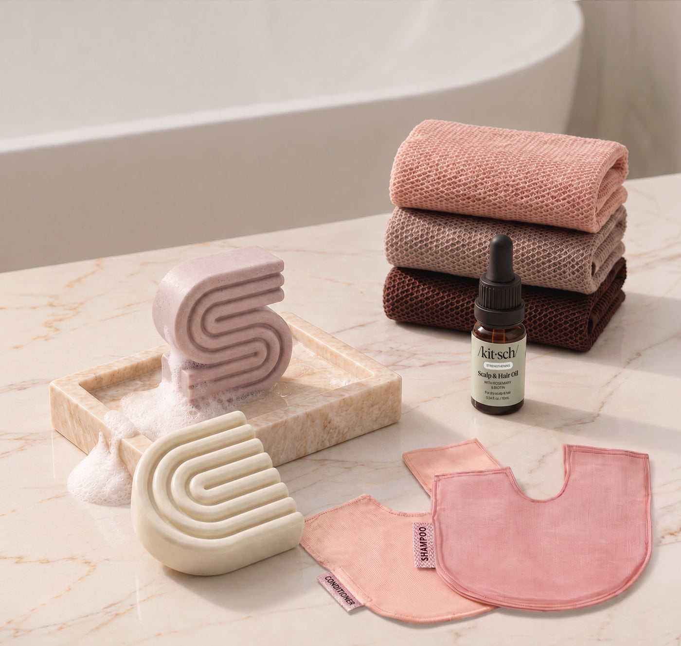 Rice Water: Kitsch Winter Welcome Kit with Rice Water shampoo and conditioner bars, Rosewood African Net Sponge, shampoo and conditioner bar bags, and Rosemary & Biotin Scalp & Hair Oil.