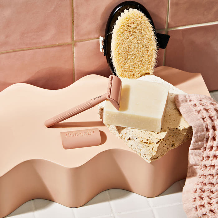 KITSCH Safety Razor & Shave Butter Bundle — feature close-up shot — solid shave butter bar lathering for close comfortable shave — eco-friendly & sustainable